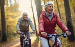 Active seniors exercising with bicycles